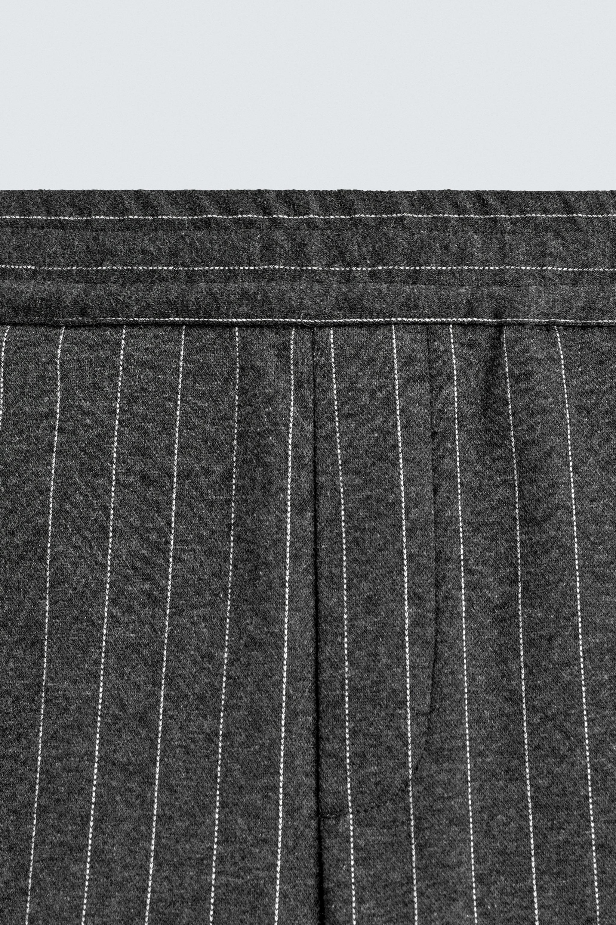 PINSTRIPE PLEATED PANTS